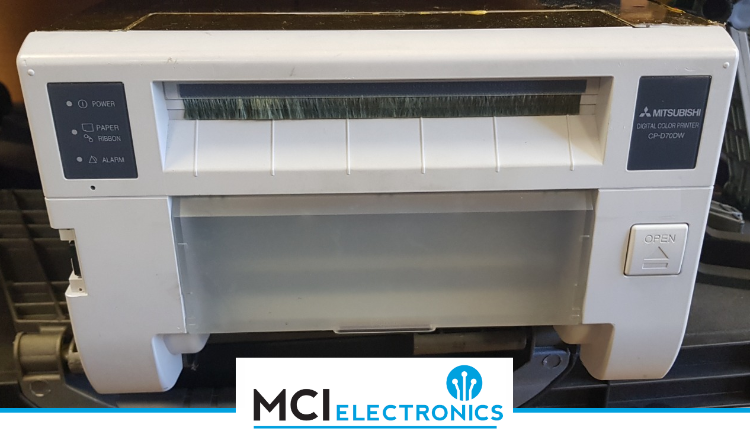 Mitsubishi digital colour printer after repair by MCI Electronics.
