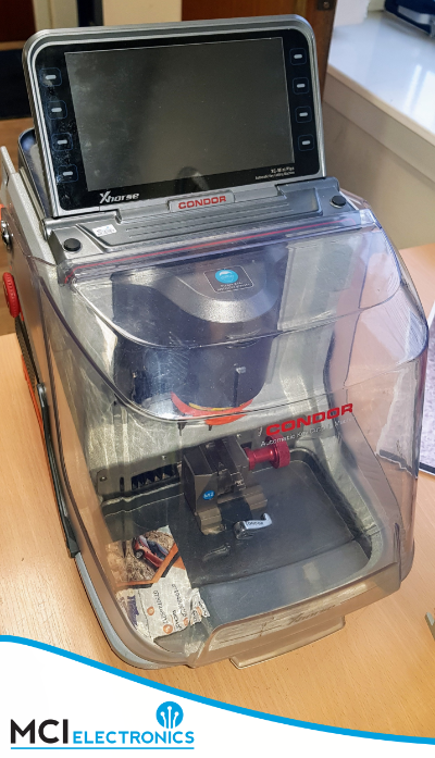 Key cutting machine after repair by MCI Electronics.