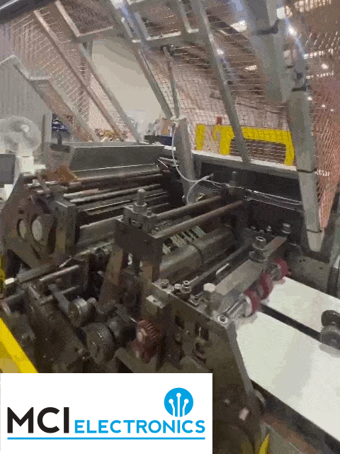 A pneumatic ram controlling a safety gate supplied and fitted by MCI Electronics.