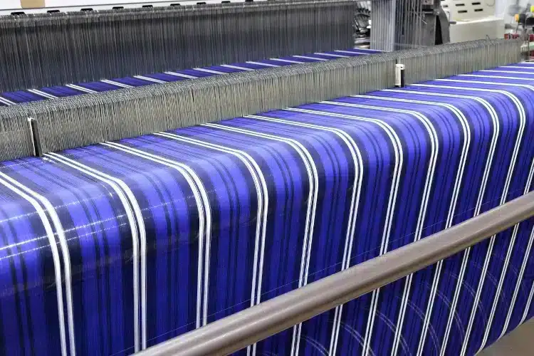 A textile weaving loom.